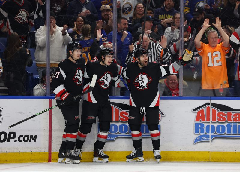 Buffalo Sabres left wing Jason Zucker celebrates his goal with teammates during the second period against the Tampa Bay Lightning at KeyBank Center.