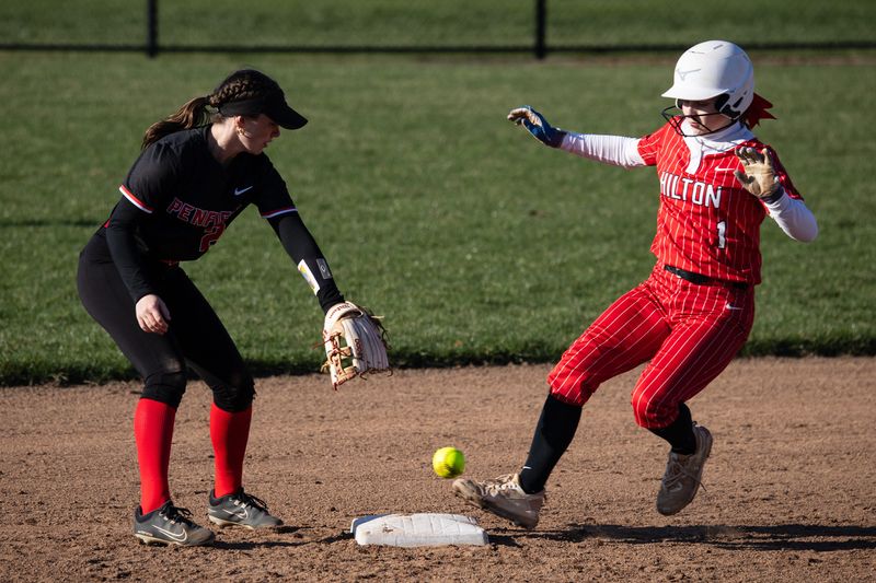 Hilton's Grace Speer stops at second base Wednesday, April 8 at Hilton High School.