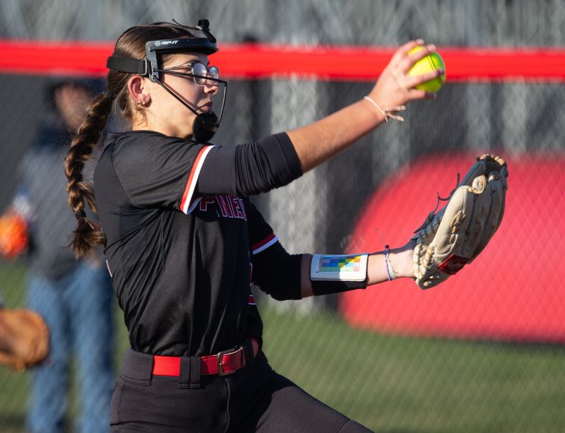 Penfield's Zara Vattimo pitches Wednesday, April 8 at Hilton High School.