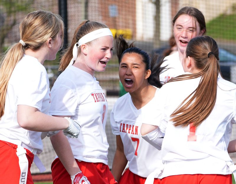 A group of Tappan Zee players celebrate after scoring a touchdown against Scarsdale during an April 10, 2026 flag football game.