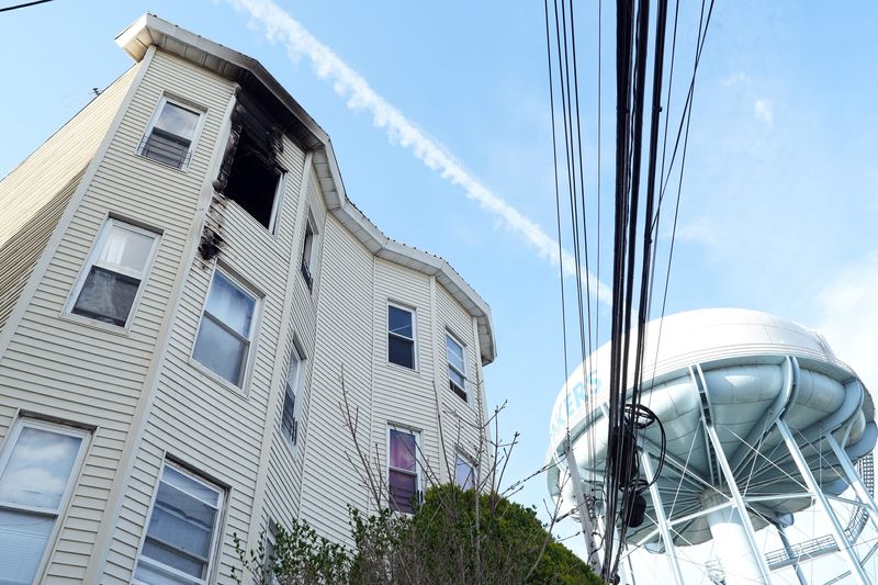 A fire on the top floor of a four story building at 1 Alder St. on Tuesday, April 14, 2026.