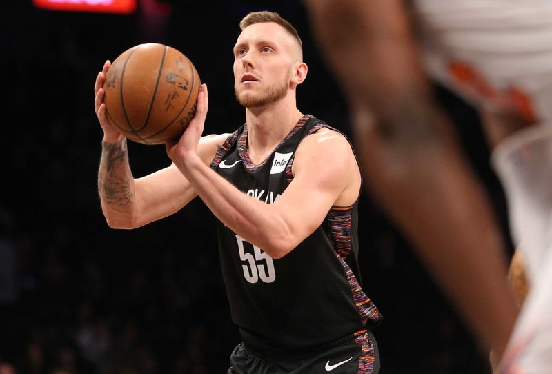Jan 25, 2019; Brooklyn, NY, USA; Brooklyn Nets forward Mitch Creek (55) shoots a free throw in place of injured Brooklyn Nets small forward Rondae Hollis-Jefferson (not pictured) during the fourth quarter against the New York Knicks at Barclays Center. Creek made one of two for his first NBA point. Mandatory Credit: Brad Penner-USA TODAY Sports