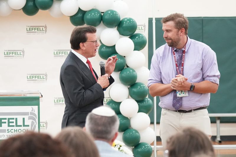 Milken Educator Awards Founder Lowell Milken, left, with social studies teacher and history department chair Harry Shontz after honoring him as New York's 2025-26 Milken Educator Award recipient at The Leffell School in Hartsdale April 17, 2026. Shontz, the first recipient from Westchester County, also received a $25,000 prize.