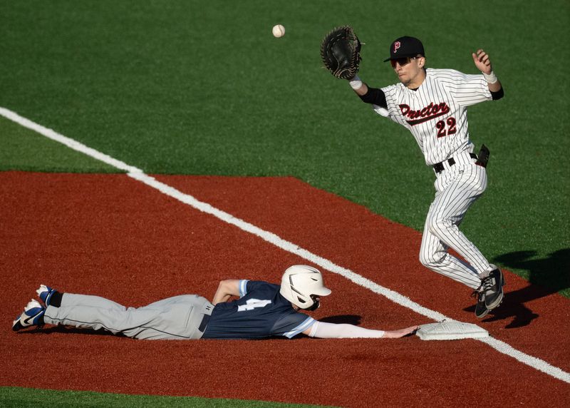 Matthew Dempsey of Central Valley Academy gets back to first base Friday before the ball reaches a leaping Michael Olivadoti of Proctor.