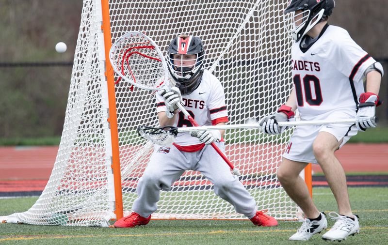 Hilton's Brendan Maxwell eyes a shot Saturday, April 18 at Hilton High School.