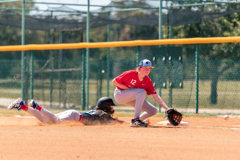 Kate Fahy, a Hackley eighth-grader and member of its modified baseball team, goes down to get a low throw during the 2026 Trailblazer Series at the Jackie Robinson Training Complex on Friday, April 17, 2026 in Vero Beach, Florida.