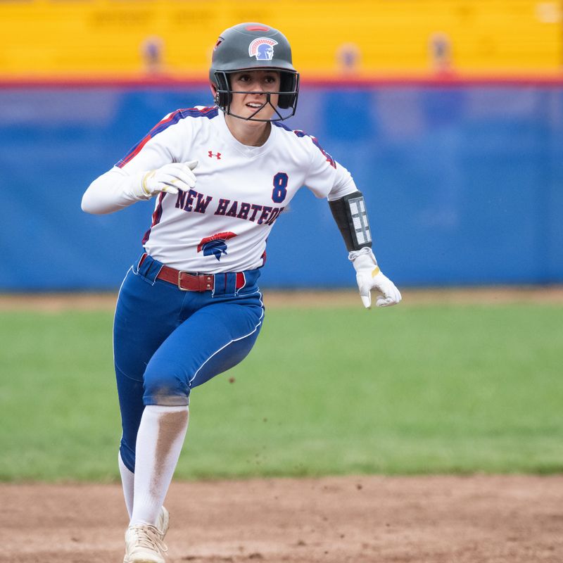 New Hartford’s Alessandra D’Apice sprints towards third base during an April 21 game at Hughes Elementary School. D'Apice and the Spartans are seeded first for Section III's Class A playoffs after reaching the finals the last two years.