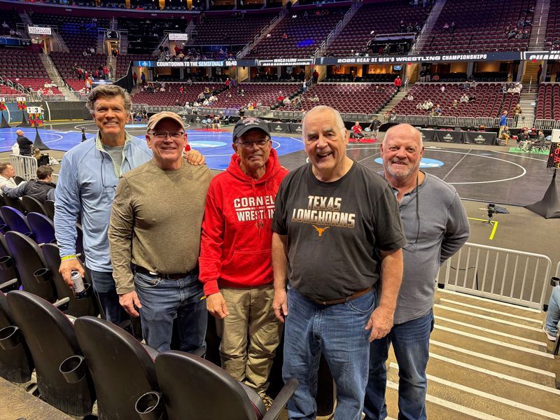 Five former Corning West wrestlers converged in Cleveland for the NCAA wrestling tournament, all coming from different parts of the nation. From left to right: Ed Sutter/New Mexico, Mark Sutter/Georgia, Greg Sutter/Oregon, David McFarland/Texas, and Don Rynearson/Colorado.