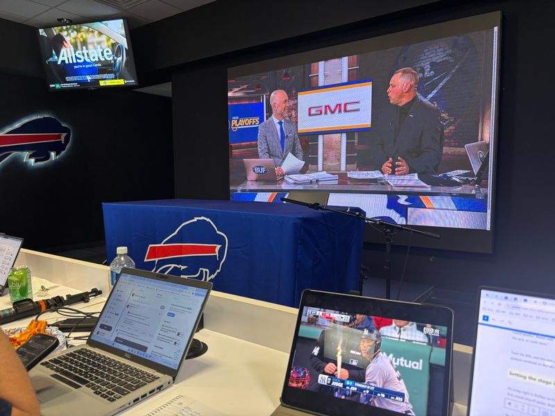It's a busy night in the Bills media room for the NFL Draft.