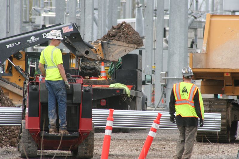 Workers move steel and earth to construct a substation which would power the Western New York Science, Technology and Advanced Manufacturing Park in Basom, Genesee County on April 16, 2026.