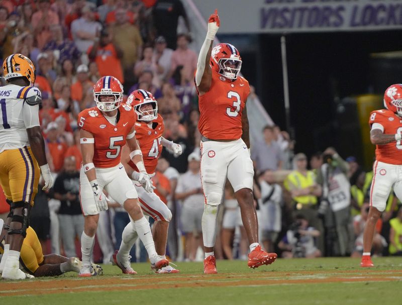 Clemson defensive end T.J. Parker celebrates a tackle against Louisiana State University during the first quarter at Memorial Stadium in Clemson, S.C. Saturday, August 30, 2025.