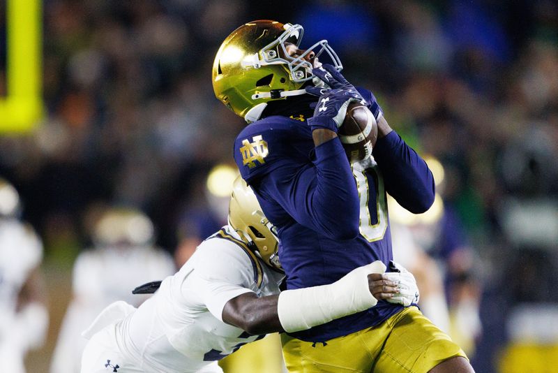 Notre Dame wide receiver Malachi Fields (0) catches a pass during the first half of a NCAA football game against Navy at Notre Dame Stadium on Saturday, Nov. 8, 2025, in South Bend.