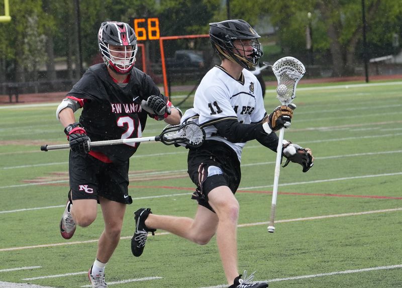 Iona and New Canaan in boys lacrosse action at Iona Prep in New Rochelle Apr. 25, 2026. New Canaan won the game 8-7 in double overtime.