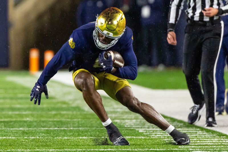 Nov 8, 2025; South Bend, Indiana, USA; Notre Dame Fighting Irish wide receiver Malachi Fields (0) makes a cut against the Navy Midshipmen during the first half at Notre Dame Stadium. Mandatory Credit: Michael Caterina-Imagn Images