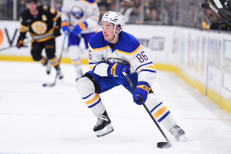 Buffalo Sabres center Noah Ostlund controls the puck during the second period in game four of the first round of the 2026 Stanley Cup Playoffs against the Boston Bruins at TD Garden. The Sabres defeat the Bruins 6-1.