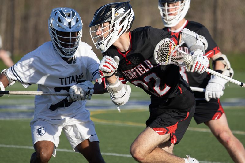 Penfield's Manny Castro controls possession Monday, April 27 at Webster Thomas High School.
