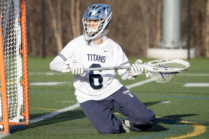 Webster Thomas' Joshua Jobson looks back after a missed shot Monday, April 27 at Webster Thomas High School.