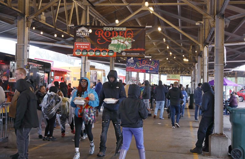 Despite the cool temperatures and steady rainfall, people showed up in good numbers for the first-of-the-season Food Truck Rodeo held at the City of Rochester Public Market Wednesday, April 29, 2026.