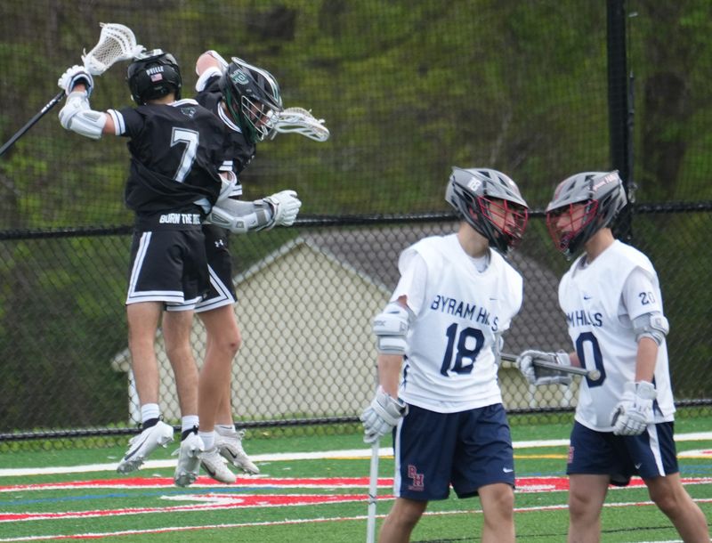 Pleasantville’s Matteo Petriccione (7) and George Kennedy (5) celebrate a first half goal against Byram Hills during boys lacrosse action at Byram Hills High School in Armonk Apr. 29, 2026. Pleasantville won the game 17-12.