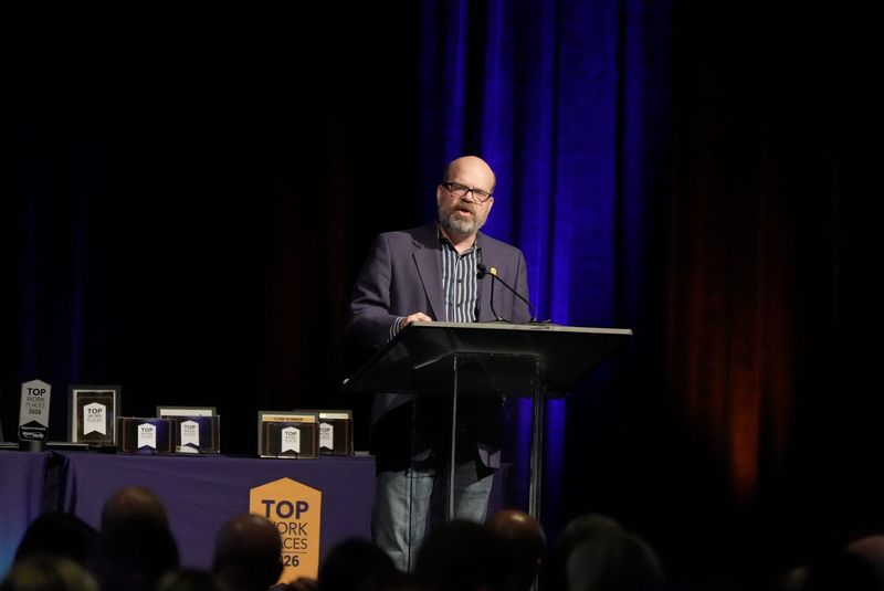 Bob Helbig, with Energage, gives a welcome speech during the 2026 Top Workplaces awards ceremony at Joseph A. Floreano Rochester Riverside Convention in Rochester on April 29, 2026.