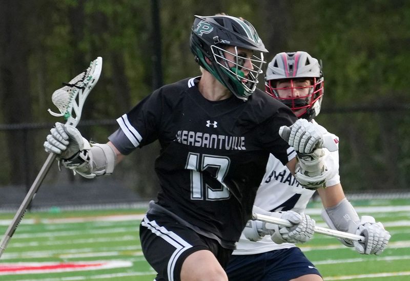 Pleasantville’s Brian Doherty (13) drives to the goal against Byram Hllls during boys lacrosse action at Byram Hills High School in Armonk Apr. 29, 2026. Pleasantville won the game 17-12.