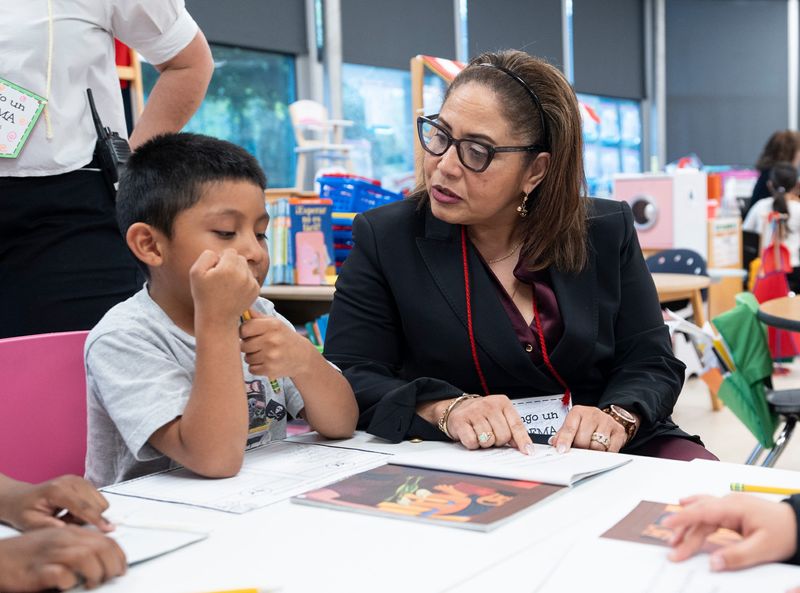 Elisa Alvarez, right, Associate Commissioner of Bilingual Education & World Languages from the New York State Education Department, works with a student in a dual language class at R.P. Connor Elementary School in Suffern on Thursday, April 30, 2026.