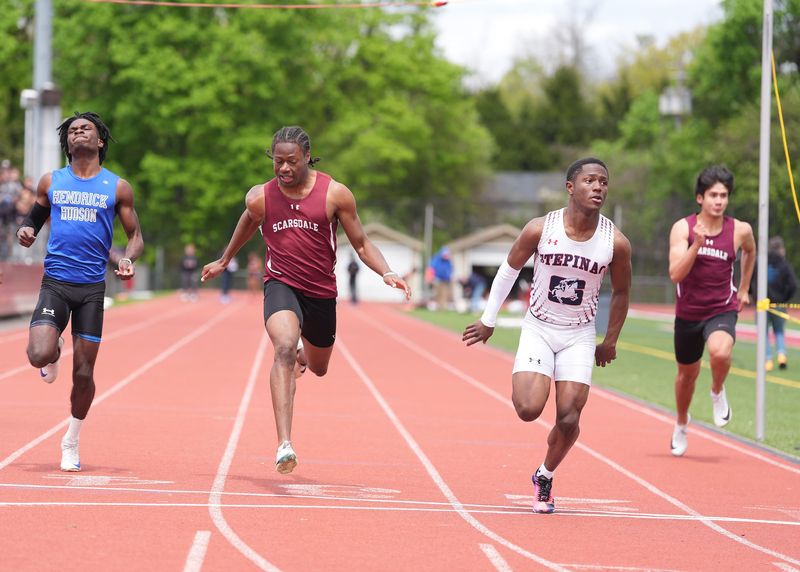 Stepinac's Ian Thomas, right, edges out Scarsdale's Labrowne Brown in the 100-meter dash finals at the Joe Wynne Somers Lions Club Invitational track & field meet at Somers High School in Lincolndale on Saturday, May 2, 2026.