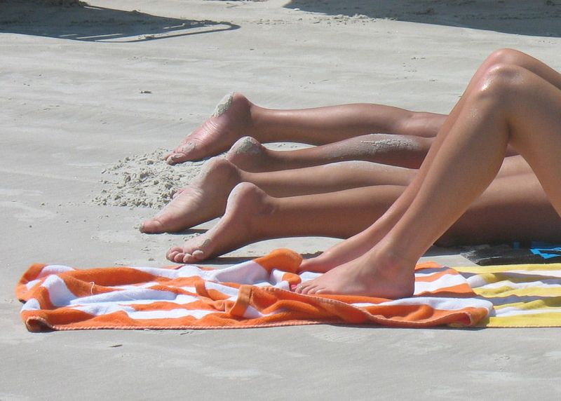 Sunbathers on most Florida beaches must cover up or risk fines and jail time.