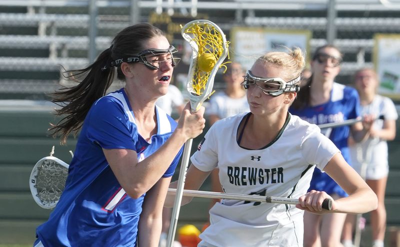 Brewster's Olivia Saccomanno guards Blind Brook's Tatum Korpi during their game at Brewster May 4, 2026.