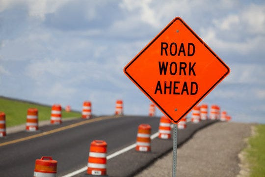 Signage for road work ahead