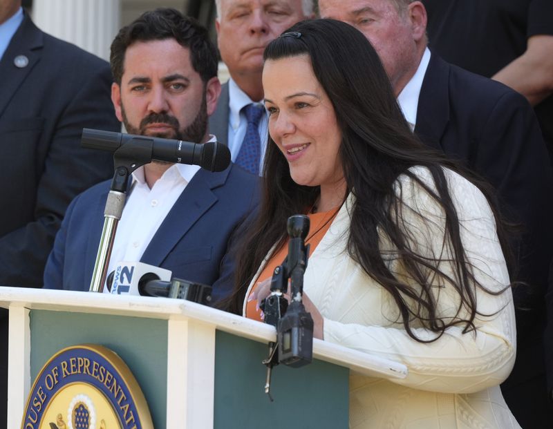 Michelle Alexander of the North Rockland Chamber of Commerce speaks alongside Mike Lawler in front of Stony Point Town Hall May 5, 2026. Lawler announced a $1 million fund obtained from Champlain Hudson Power to support small businesses in North Rockland impacted by construction along Route 9W tied to CHPE transmission line project.