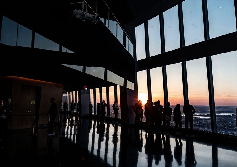 Visitors take in a sunset from the One World Observatory on top of One World Trade Center in Manhattan May 5, 2026. The observatory is on the 100 to 102 floors in One World Trade Center.
