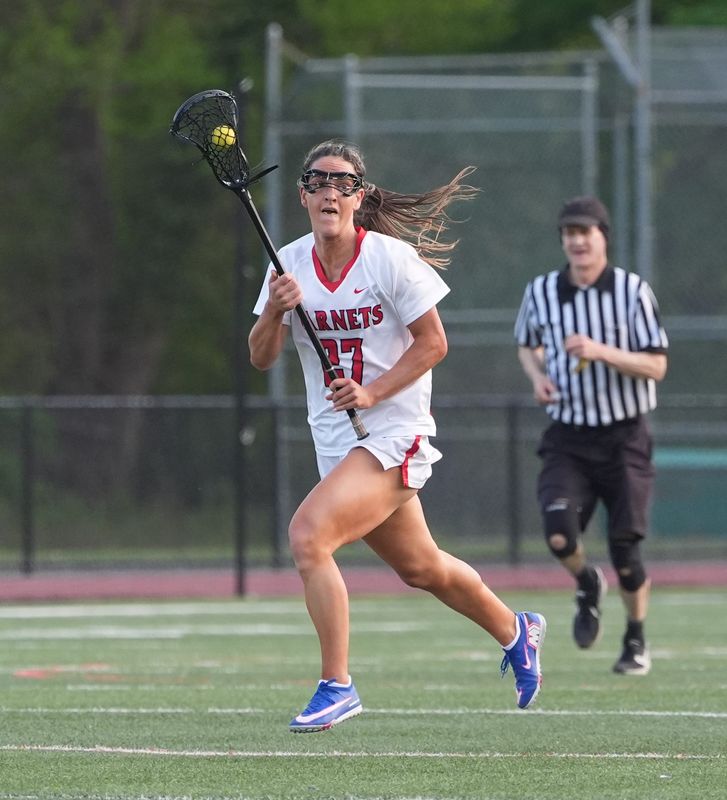 Rye's Paige Tepedino (27) with possession during girls lacrosse action against Nyack at Rye High School on Tuesday, May 5, 2026. Nyack won in overtime 13-12.