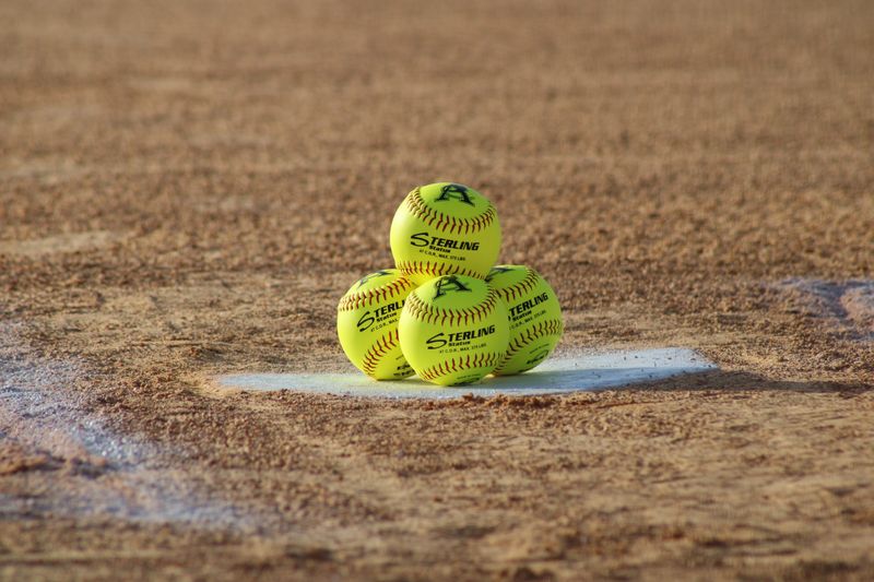 STOCK | Softballs are stacked on home plate before a Gateway Conference high school softball final between Baldwin and Atlantic Coast in Jacksonville, Florida, on April 10, 2025.
