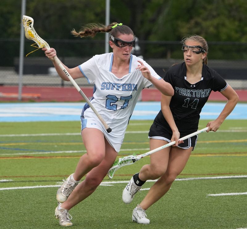 Suffern's Nevin Sullivan is pressured by Yorktown's Khloe Clarkin May 6, 2026. Suffern won 13-12 in overtime.