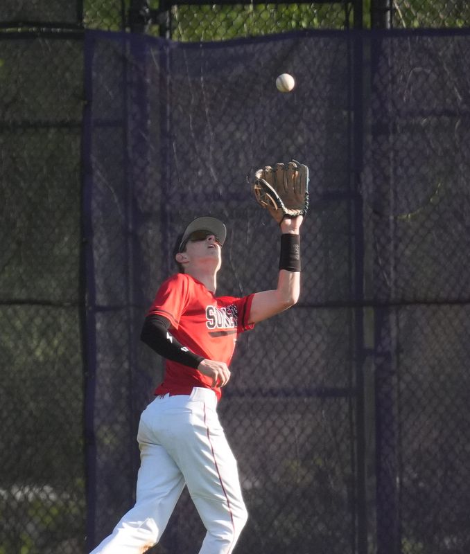 Somers center fielder Gavin Kelly (17) pulls in a fly ball during baseball action against John Jay at John Jay High School in Cross River on Thursday, May 7, 2026.