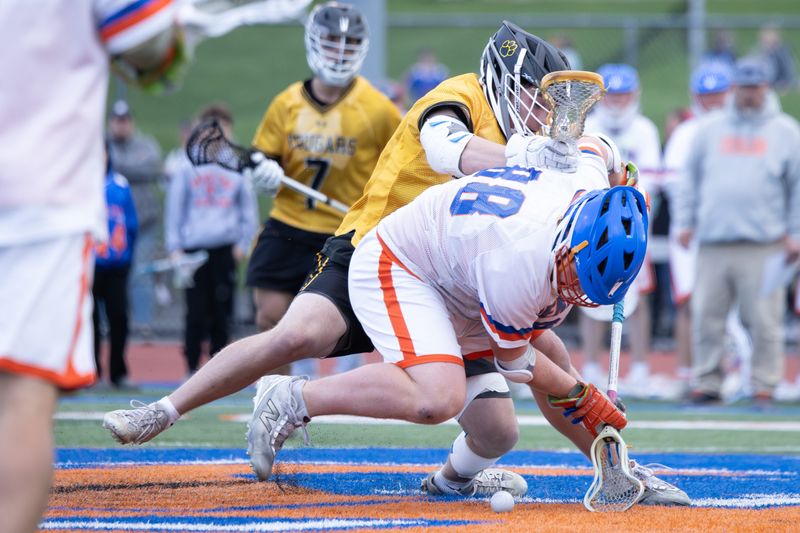 Penn Yan's Greyson Hathway battles for a ground ball Thursday, May 7 at Penn Yan Academy.
