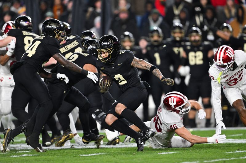 Nov 28, 2025; West Lafayette, Indiana, USA; Purdue Boilermakers wide receiver Michael Jackson III (2) returns a kickoff during the first quarter against the Indiana Hoosiers at Ross-Ade Stadium. Mandatory Credit: Marc Lebryk-Imagn Images