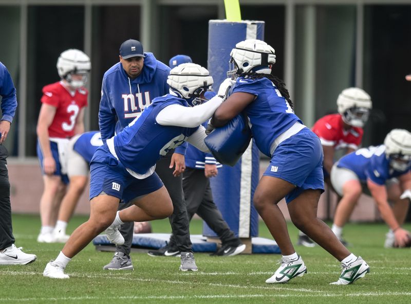 May 9, 2026; East Rutherford, NJ, USA; New York Giants offensive lineman Francis Mauigoa (65) participates in a drill during rookie minicamp at Quest Diagnostics Training Center. Mandatory Credit: John Jones-Imagn Images