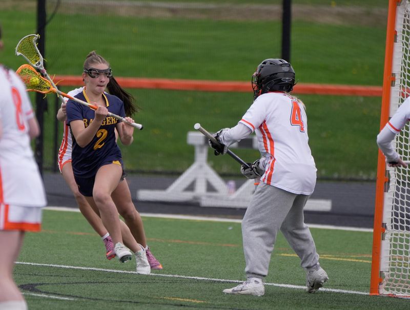 Spencerport's Ava Pittman scores on this shot on goal getting the ball past Churchville-Chili's goalie Emily Murano during their game at the Churchville-Chili High School field in Churchville on May 12, 2026.