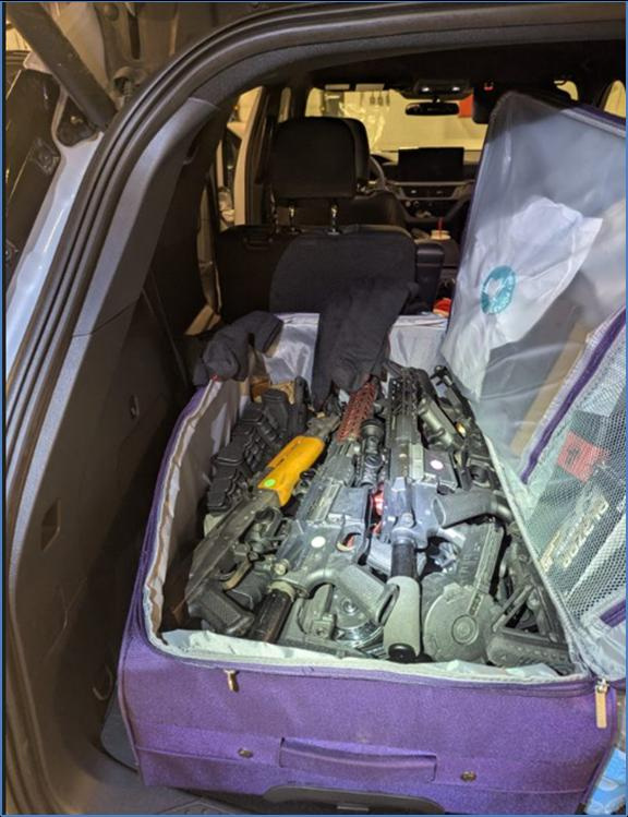 Investigators said officers recovered 89 firearms from the vehicle, including at least 17 reported stolen weapons.