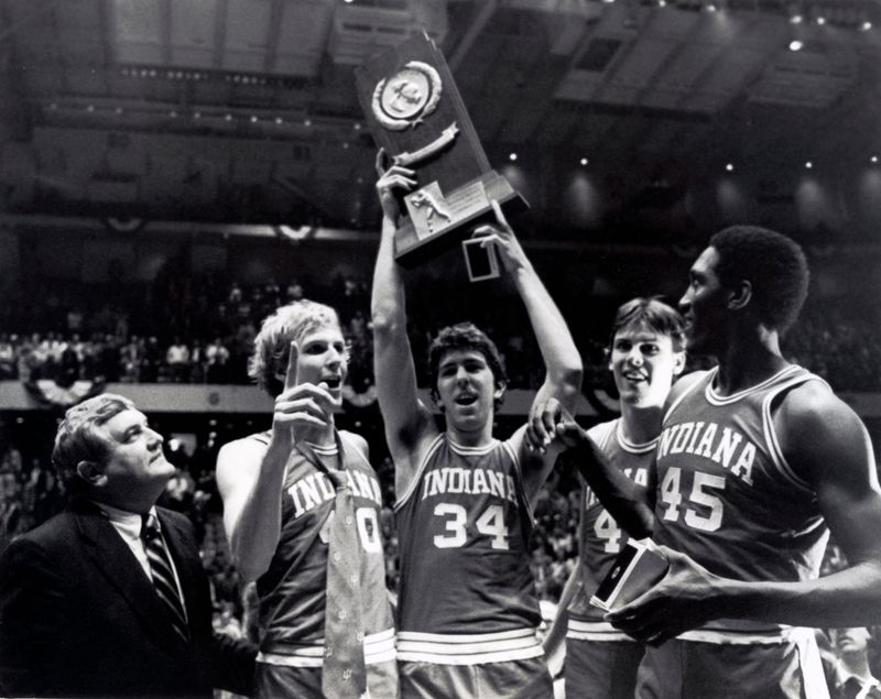 Mar 30, 1981; Philadelphia, PA, USA; FILE PHOTO; Indiana Hoosiers forward Glen Grunwald (40) Steve Risley (34) and Ray Tolbert (45) celebrate with the trophy after a victory against the North Carolina Tarheels during the 1981 Final Four. Indiana defeated North Carolina 63-50. Mandatory Credit: Malcolm Emmons-USA TODAY Sports