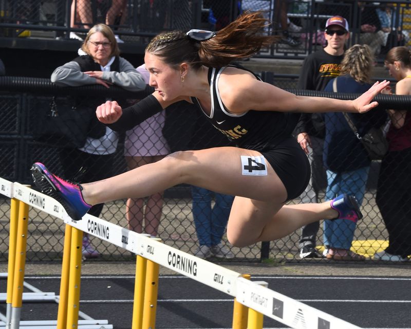 Corning's Cella McLaughlin finished first in the 100-meter hurdles in 13.99 seconds at the Corning Fast Times Invitational on May 15, 2026 at Corning Memorial Stadium.