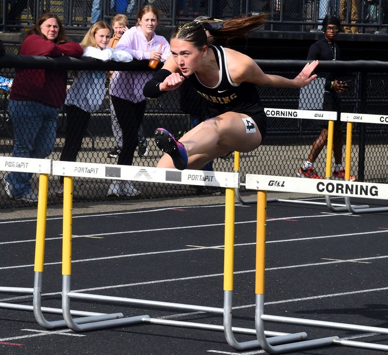 Corning's Cella McLaughlin finished first in the 100-meter hurdles in 13.99 seconds at the Corning Fast Times Invitational on May 15, 2026 at Corning Memorial Stadium.