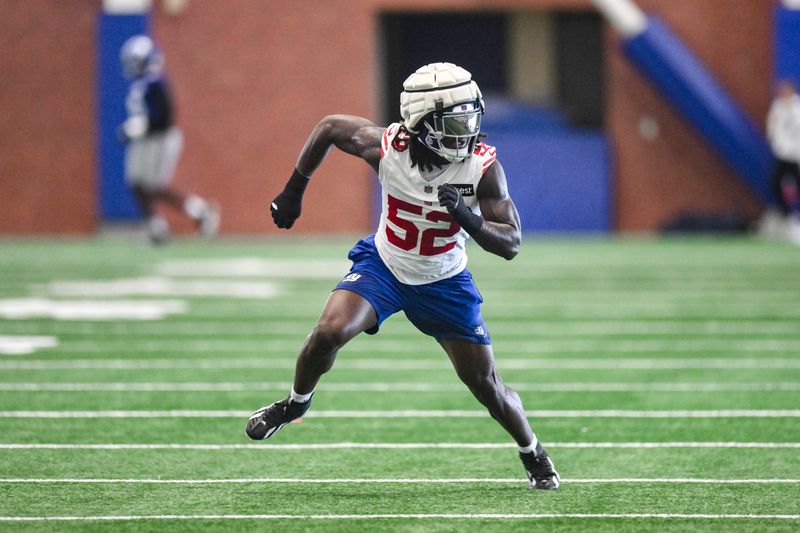 May 21, 2026; East Rutherford, NJ, USA; New York Giants linebacker Arvell Reese (52) participates in a drill during organized team activities at Quest Diagnostics Training Center. Mandatory Credit: John Jones-Imagn Images