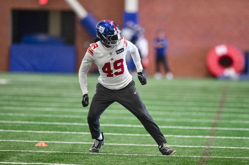 May 21, 2026; East Rutherford, NJ, USA; New York Giants linebacker Tremaine Edmunds (49) participates in a drill during organized team activities at Quest Diagnostics Training Center. Mandatory Credit: John Jones-Imagn Images