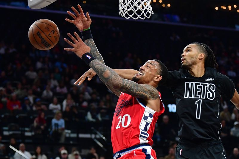 Jan 25, 2026; Inglewood, California, USA; Brooklyn Nets forward Ziaire Williams (1) blocks the shot of Los Angeles Clippers forward John Collins (20) during the first half at Intuit Dome. Mandatory Credit: Gary A. Vasquez-Imagn Images