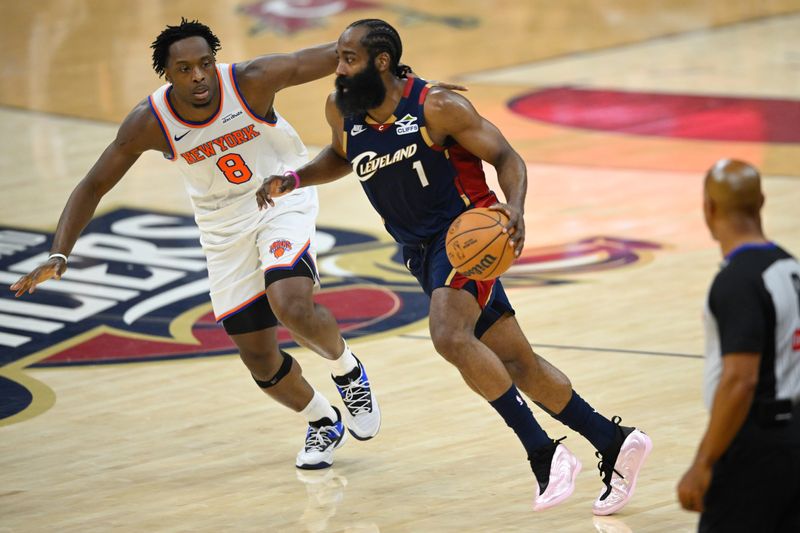 May 25, 2026; Cleveland, Ohio, USA; Cleveland Cavaliers guard James Harden (1) moves the ball while defended by New York Knicks forward OG Anunoby (8) in the first quarter during game four of the eastern conference finals for the 2026 NBA playoffs at Rocket Arena. Mandatory Credit: David Richard-Imagn Images