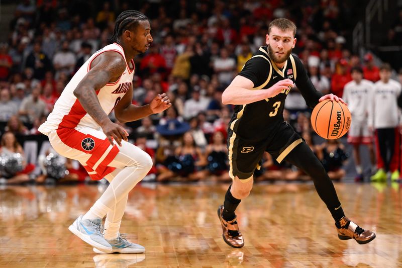 Mar 28, 2026; San Jose, CA, USA; Purdue Boilermakers guard Braden Smith (3) dribbles the ball defended by Arizona Wildcats guard Jaden Bradley (0) in the second half during an Elite Eight game of the West Regional of the men's 2026 NCAA Tournament at SAP Center. Mandatory Credit: Eakin Howard-Imagn Images