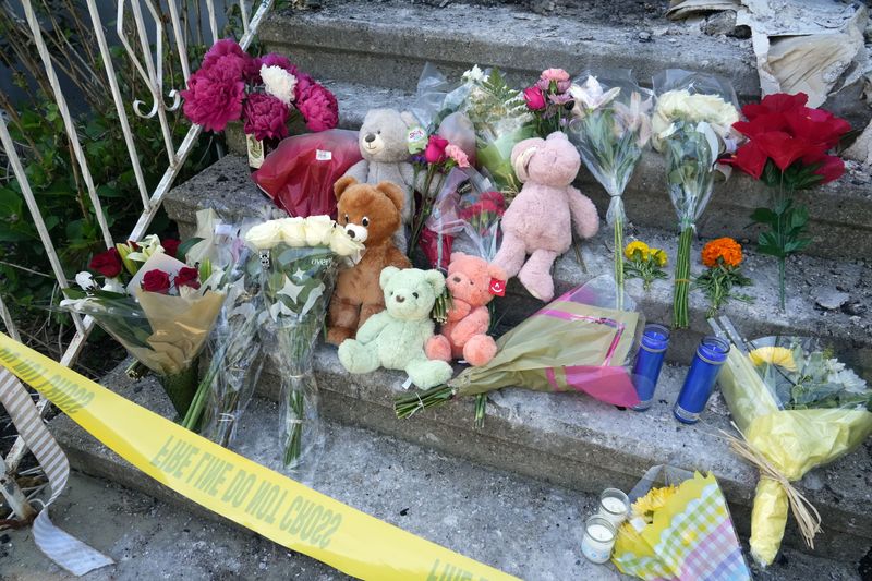 A memorial on the front steps of the Toone family home on Sherwood Road in Cortlandt Manor May 28, 2026 the day after a fire killed teenagers Alina Toone and Jeremiah Toone.